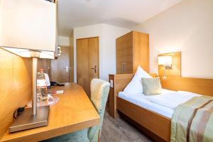 Voodi või voodid majutusasutuse Hotel Neuwarft Altbau toas