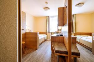 Voodi või voodid majutusasutuse Hotel Neuwarft Altbau toas