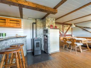 A kitchen or kitchenette at Holiday home with private garden