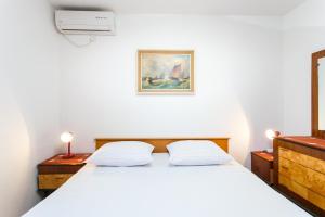 Кровать или кровати в номере Guest House Raguž
