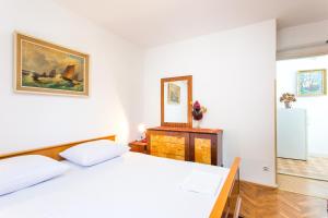 Кровать или кровати в номере Guest House Raguž