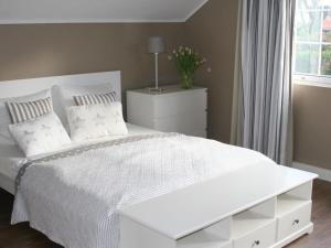 Llit o llits en una habitació de Spacious Holiday Home in Bastorf near Seabeach with Garden