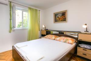 Кровать или кровати в номере Guest House Raguž