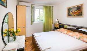 Кровать или кровати в номере Guest House Raguž