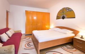 Кровать или кровати в номере Guest House Raguž