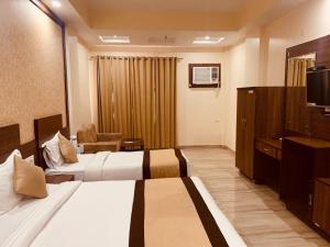 Hotel The Vaishno Devi Hills客房内的一张或多张床位