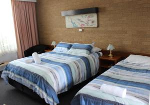 Krevet ili kreveti u jedinici u okviru objekta Portland Retro Motel