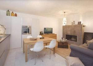 Televízia a/alebo spoločenská miestnosť v ubytovaní BR Villas by Rent Istria