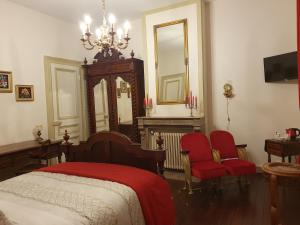Кровать или кровати в номере B & B Les Secrets des Loges