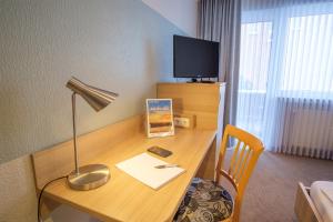 TV a/nebo společenská místnost v ubytování Hotel & Restaurant Prüser´s Gasthof