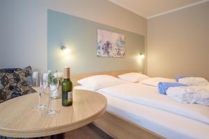 Postel nebo postele na pokoji v ubytování Hotel & Restaurant Prüser´s Gasthof