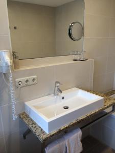 Koupelna v ubytování Hotel Neumayr