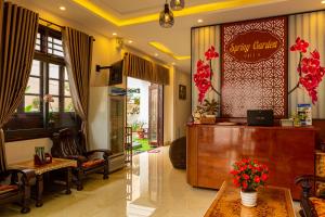 a hair salon with a waiting room and a waiting room at Spring Garden Villa Hoi An in Hoi An