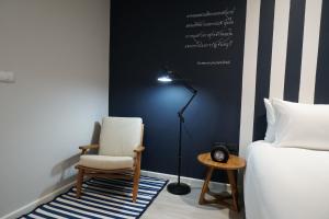 Posezení v ubytování Blu Monkey Hub and Hotel Chanthaburi