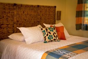 Katil atau katil-katil dalam bilik di Casas Di Monte Ecopousada