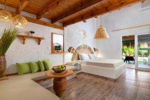 Posteľ alebo postele v izbe v ubytovaní Elefteria Apts & Suites + 37 fotografií
