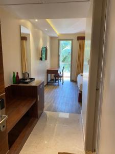 Postel nebo postele na pokoji v ubytování Hotel Ami Grace
