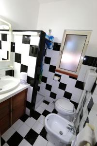 Koupelna v ubytování Casa Josto