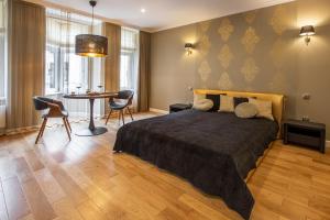 Ένα ή περισσότερα κρεβάτια σε δωμάτιο στο Apartamenty Katarzynka