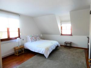 Postel nebo postele na pokoji v ubytování Le Gîte bleu