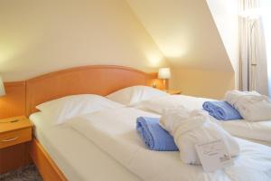 Postel nebo postele na pokoji v ubytování Hotel & Restaurant Prüser´s Gasthof