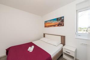 Krevet ili kreveti u jedinici u okviru objekta Villa Kalada - Adriatic Luxury Villas