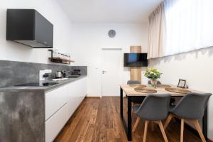 Kuchyňa alebo kuchynka v ubytovaní Apartmány Resort Vrchlabí