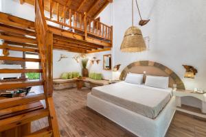 Posteľ alebo postele v izbe v ubytovaní Elefteria Apts & Suites
