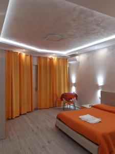 Posteľ alebo postele v izbe v ubytovaní B&B La Colonna