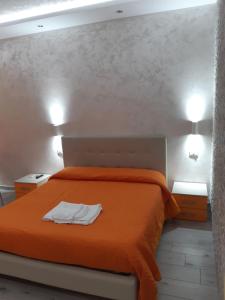 Posteľ alebo postele v izbe v ubytovaní B&B La Colonna