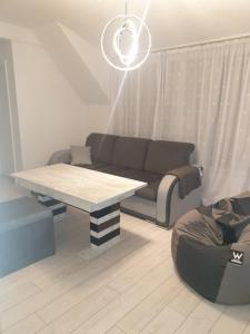 Χώρος καθιστικού στο Cosy Charming Apartment