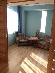 Ruang duduk di Sunny Aura apartment