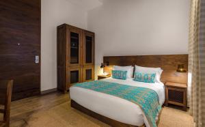 Postel nebo postele na pokoji v ubytování Sophia Hotel
