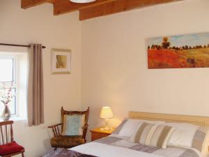 Postel nebo postele na pokoji v ubytování Bridies Holiday Cottage Roundstone