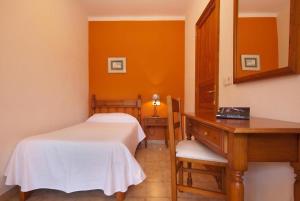 A bed or beds in a room at Pinos Altos T2 2 Még 11 kép