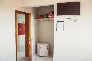 TV a/nebo společenská místnost v ubytování Hotel Colina