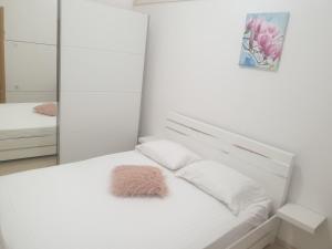 Postel nebo postele na pokoji v ubytování Apartment Ivano