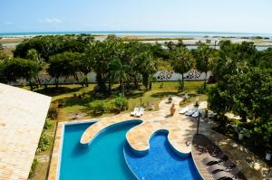 an overhead view of a swimming pool at a resort at Refugios Parajuru - Pavilhão in Parajuru