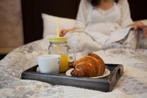 En eller flere senger på et rom på Hotel "Srbija Tis"