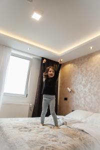 En eller flere senger på et rom på Hotel "Srbija Tis"