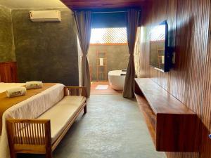 Katil atau katil-katil dalam bilik di Hotel Casa do Mar