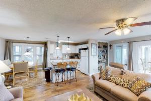 a living room and kitchen with a couch and a table at 41057-2 Hwy 12 Islander Condo in Avon