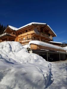 a pile of snow in front of a building at Oberfasser in Westendorf