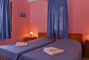 Posteľ alebo postele v izbe v ubytovaní Lefkada Villas by Omikron Selections