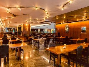 Reštaurácia alebo iné gastronomické zariadenie v ubytovaní Ouro Minas Hotel Belo Horizonte, Dolce by Wyndham