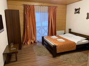 Ein Bett oder Betten in einem Zimmer der Unterkunft Shulc