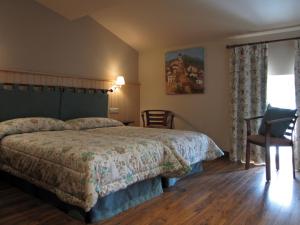 Postel nebo postele na pokoji v ubytování Hostal Beti-jai