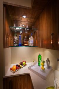 
a kitchen with a sink and a counter top at Seminole Hard Rock Hotel and Casino Tampa in Tampa
