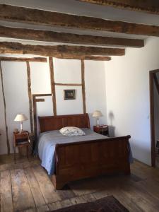 Кровать или кровати в номере Dominant la vallee de la dordogne