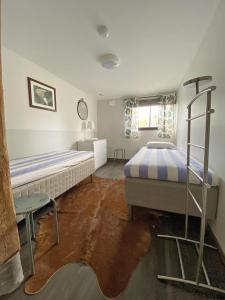 Ένα ή περισσότερα κρεβάτια σε δωμάτιο στο Hults-Boaryd Golf och B&B